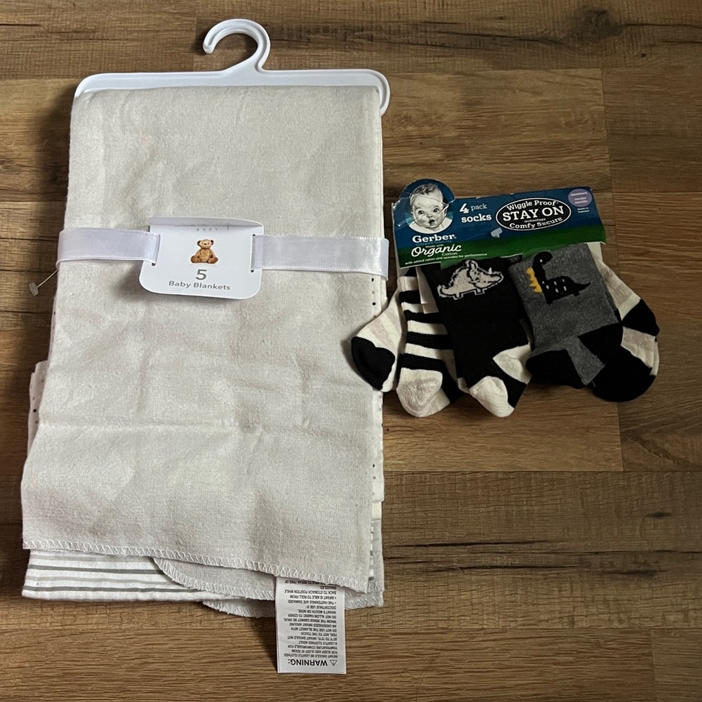 Rene rofe baby bundle baby blankets and Gerber organic baby socks Neutral colors